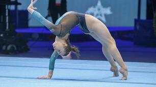 Спортивна гімнастика: чоловічі та жіночі дисципліни.