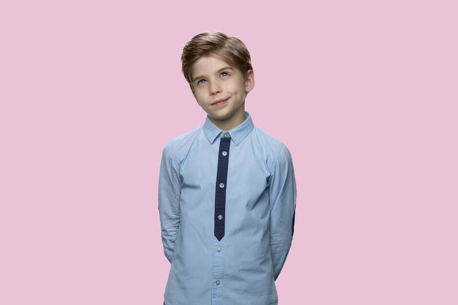 Portrait of pensive little boy on color background. - Фото, зображення